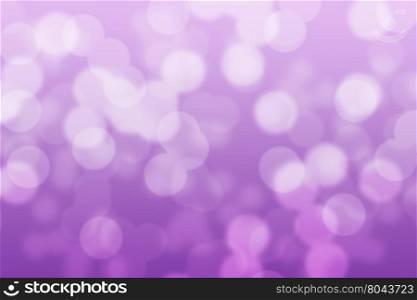 Abstract circular violet and purple light bokeh background