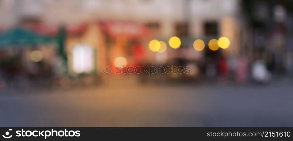 Abstract city lights blur blinking background. Soft focus. Horizontal long banner.