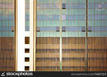 Abstract close up of square layout modern office with steel and glass facade