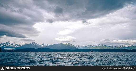 abstract cloudy waterscape AND MOUNTAIN RANGE IN ALASKA