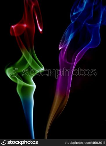 abstract colored smoke in a black background