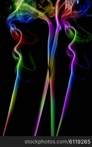 abstract colored smoke in a black background