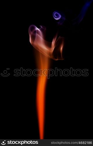 abstract colored smoke isolated on black background