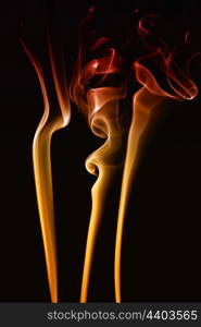 abstract colored smoke on a black background