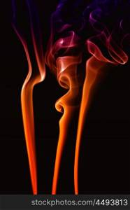 abstract colored smoke on a black background