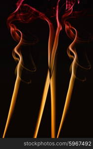 abstract colored smoke on a black background