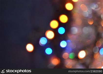 Abstract colorful defocused background. Glitter vintage lights background.. Abstract bokeh night city background