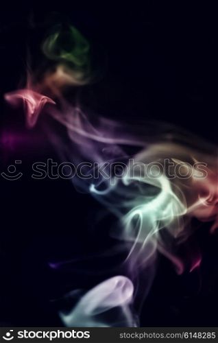 Abstract colorful smoke on a black backgroundAbstract colorful smoke on a black background