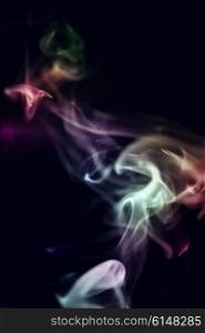Abstract colorful smoke on a black backgroundAbstract colorful smoke on a black background