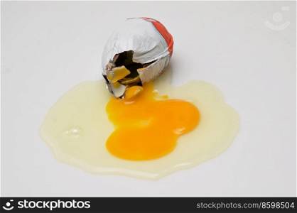 Abstract Cracked Egg With Yolk from A Chocolate Surprise Egg 