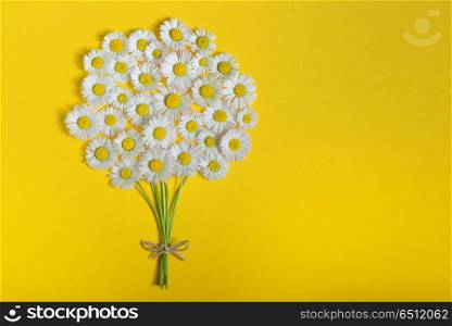 Abstract daisy flower bouquet on yellow background. Abstract daisy flower bouquet