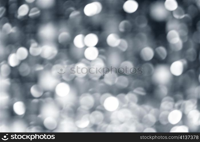 Abstract defocused blur silver christmas lights background