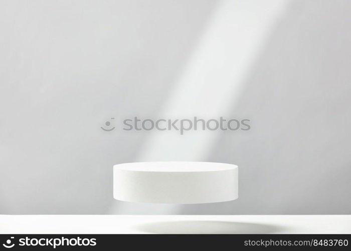 Abstract empty white podium with geometric shadows on blue background. Mock up stand for product presentation. 3D Render. Minimal concept. Advertising template