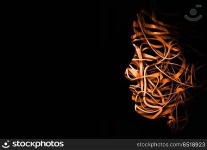 abstract face with a tangle of lines making up the outline. abstract face orange