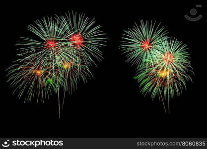 abstract Fireworks light up the dark sky background