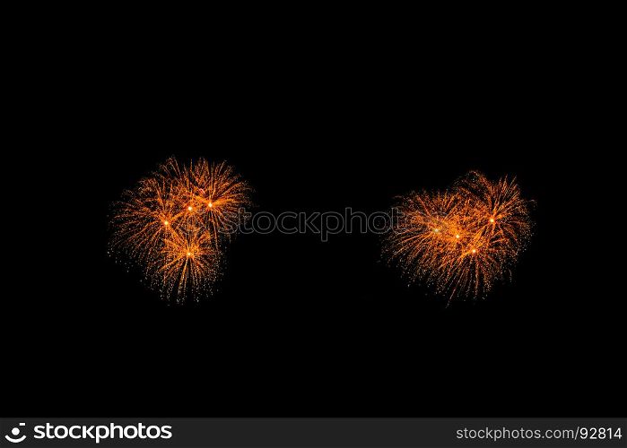 abstract Fireworks light up the dark sky background