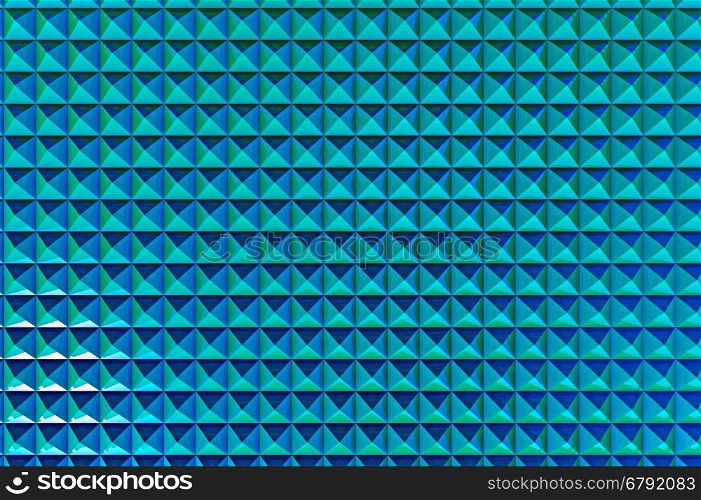 Abstract geometric pattern of blue pyramids, 3D rendering
