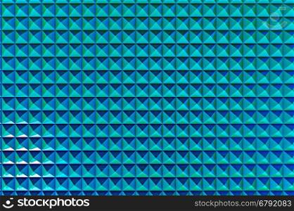 Abstract geometric pattern of blue pyramids, 3D rendering