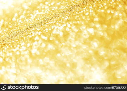 Abstract glitter bokeh holiday golden background