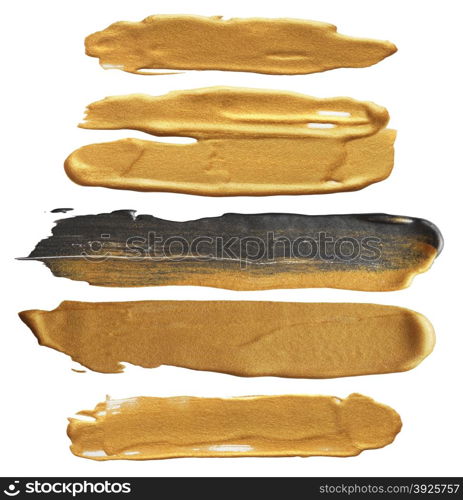 Abstract gold acrylic and watercolor brush strokes.