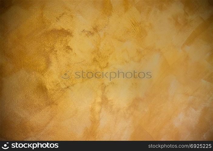Abstract gold background with aged concrete texture