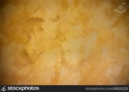 Abstract gold background with aged concrete texture