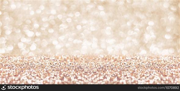 Abstract gold floor and wall glitter blur background studio room with bokeh lights,Sparkling backdrop for display or montage of product in holiday seasonal concept