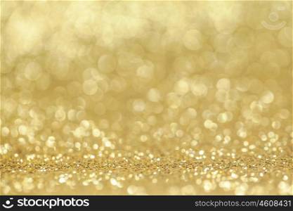 Abstract golden glitter background. Abstract golden glitter light bokeh holiday party background
