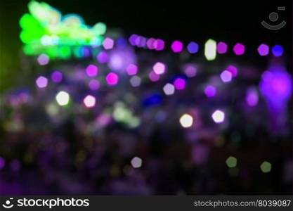 Abstract green and violet night lights with blurred background