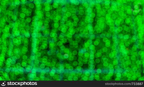 Abstract green color with bokeh defocused lights background. Abstract color background