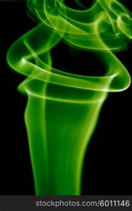 abstract green smoke in a black background