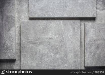 Abstract grey background texture at table or wall surface. Gray piece of chipboard at table background surface