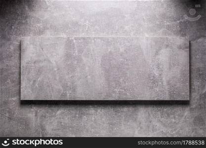 Abstract grey background texture at table or wall surface. Gray piece of chipboard at table background surface