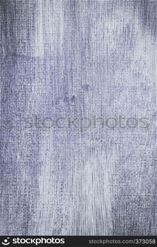 Abstract hand painted blue canvas background texture.