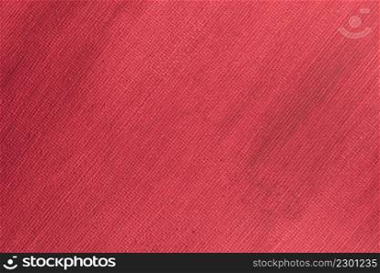 Abstract hand painted red canvas background texture.