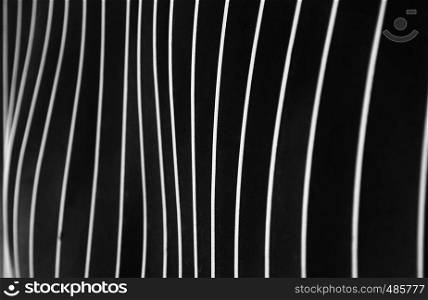 Abstract image of a fence with bent bars, high contrast