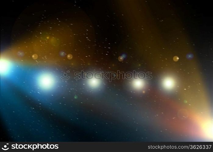 Abstract image of light flashes against dark background