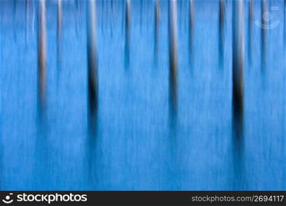 Abstract image of piers in water