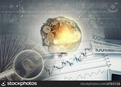 Abstract image planet earth on background of business devices. Elements of this image are furnished by NASA. Business theme