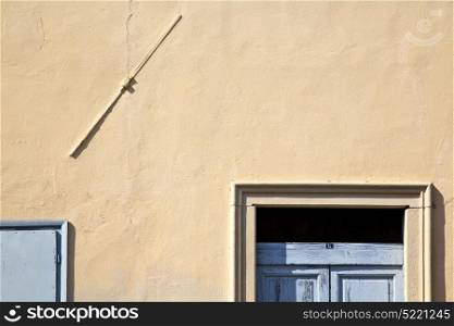abstract in venegono italy the old wall and church door