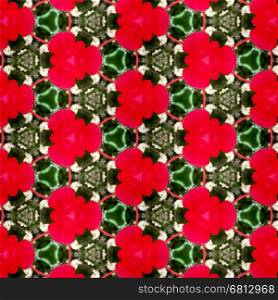 Abstract kaleidoscopic texture or background pattern design made from red hibiscus flower