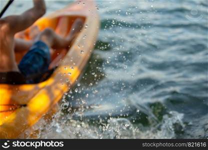 abstract kayak action on a mountain lake
