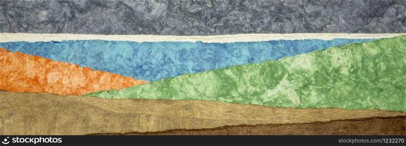 abstract landscape created with amate bark papers handmade in Mexico from Amate, Nettle, and Mulberry trees, panoramic banner