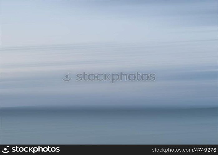 Abstract landscape image of blurred coastal sunrise