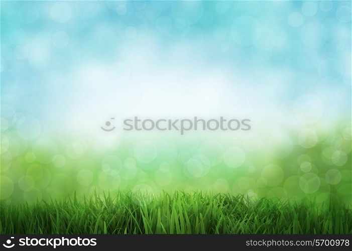 Abstract landscape with green grass and a blue sky