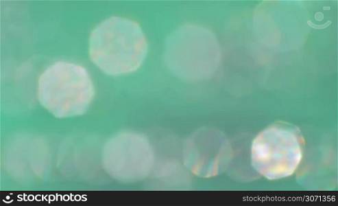 Abstract macro of light bokeh on green background
