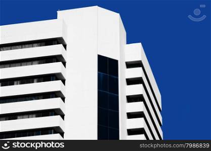 Abstract minimal style architecture background. Modern building facade detail over blue sky