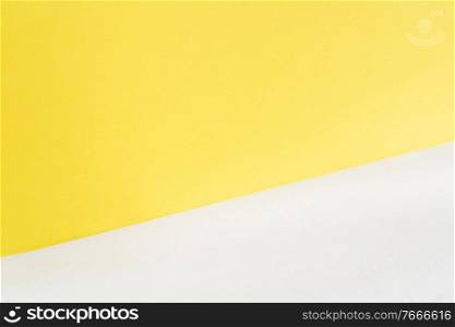 abstract modern handmade paper background in ultimate gray and illuminating yellow colors. abstract modern paper background