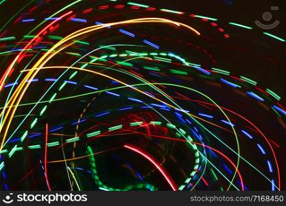 Abstract motion background with colorful bright blurred lights
