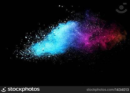 Abstract multicolor powder on black background. holi festival.